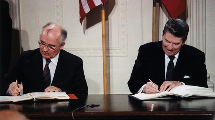 Mikhail Gorbachev and Ronald Reagan signing the Intermediate-Range Nuclear Forces Treaty in 1987.