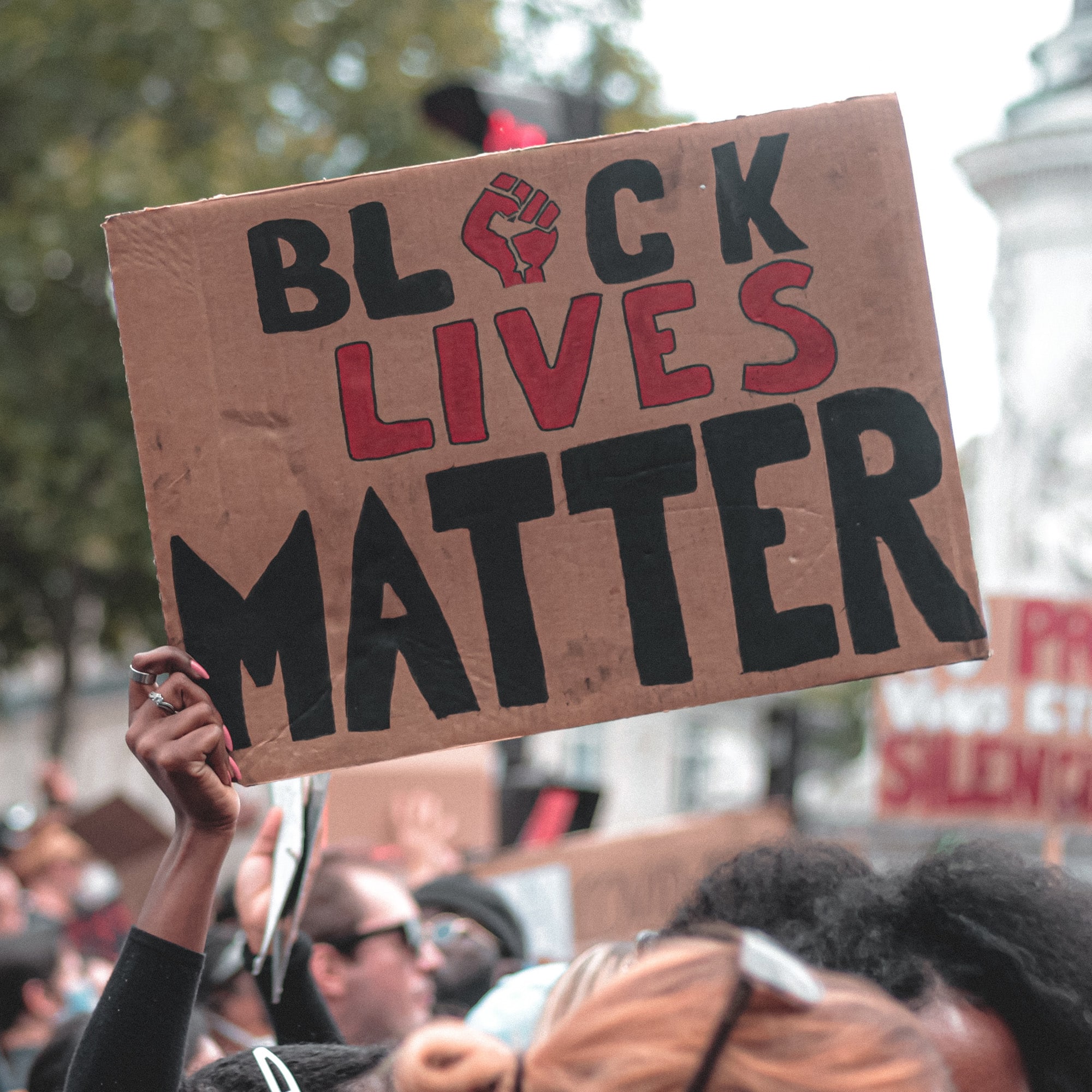Protestor with "Black Lives Matter" sign
